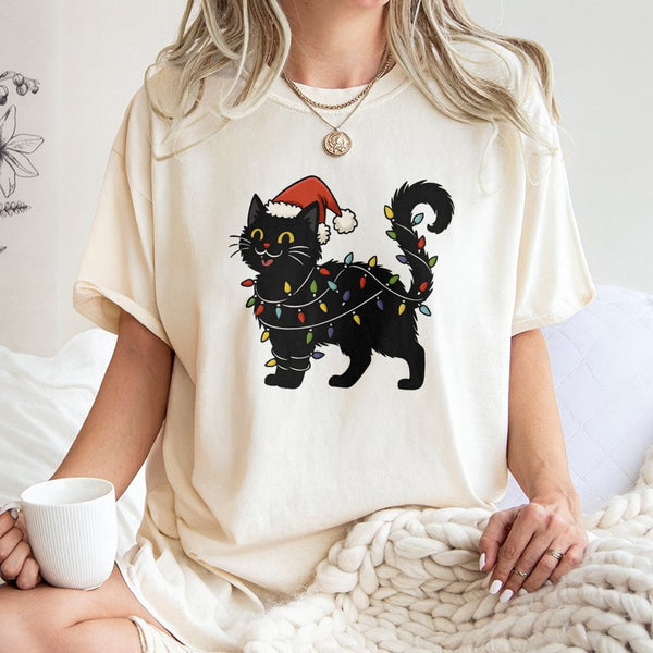 Santa Hat Cat Graphic Tee, Black Cat Christmas T-Shirt, Festive Holiday String Lights Shirt, Adorable Kitty Christmas T-Shirt